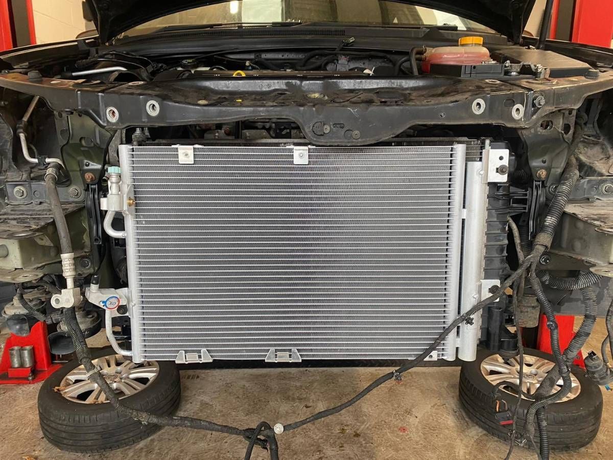 New air con condenser fitted to a Vauxhall Astra with the front bumper removed