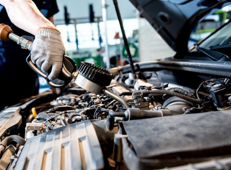 Part of car MOT service in workshop in Reading for a Theale customer
