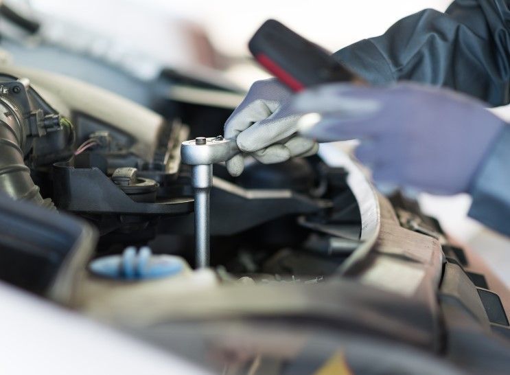 initial check of engine during an MOT test in Reading for a Shinfield customer