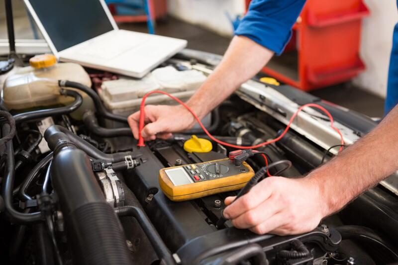 Part of car MOT service in workshop for Tilehurst customer