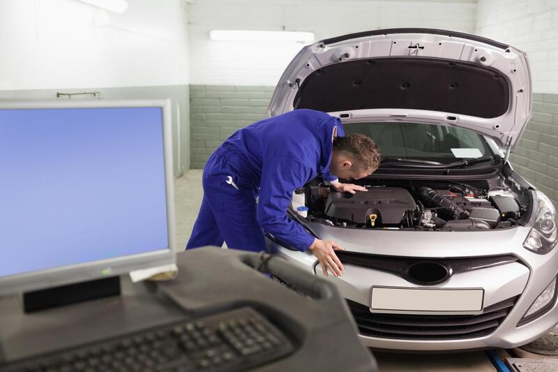 initial check of engine at start of car service in Tilehurst