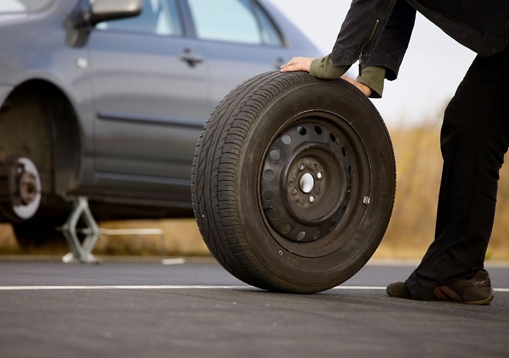 Tyre being fitted at as business car park in Reading