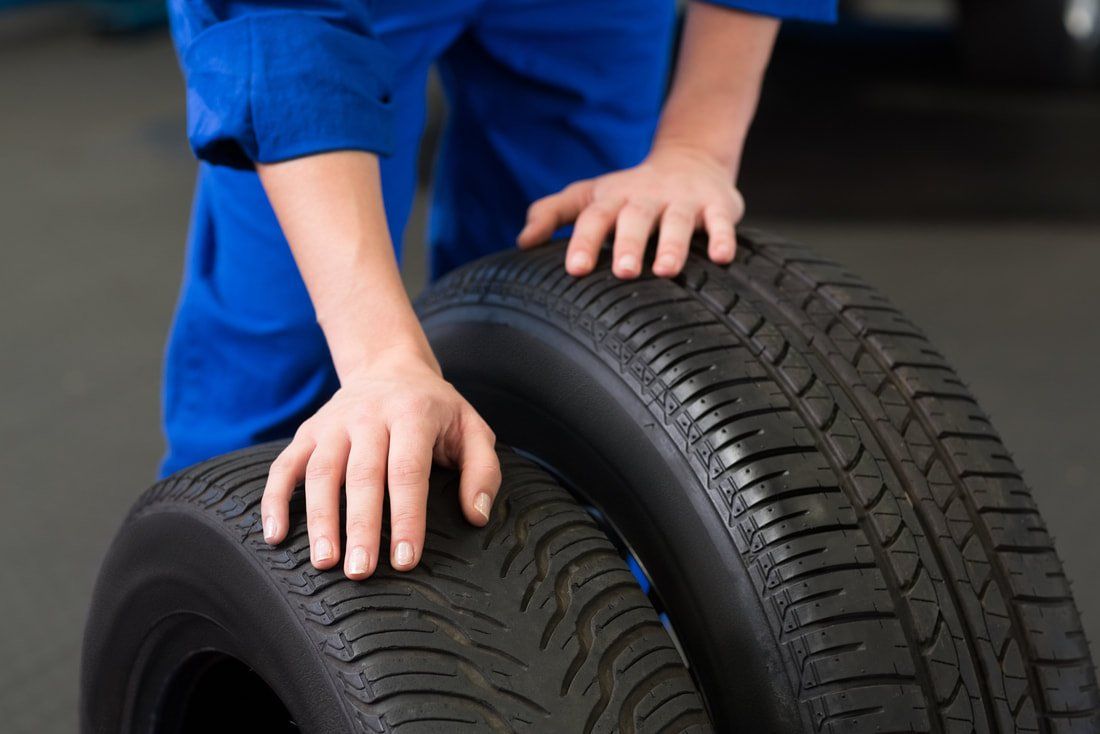 Mobile Tyre Fitting Reading taking new tyres to a car
