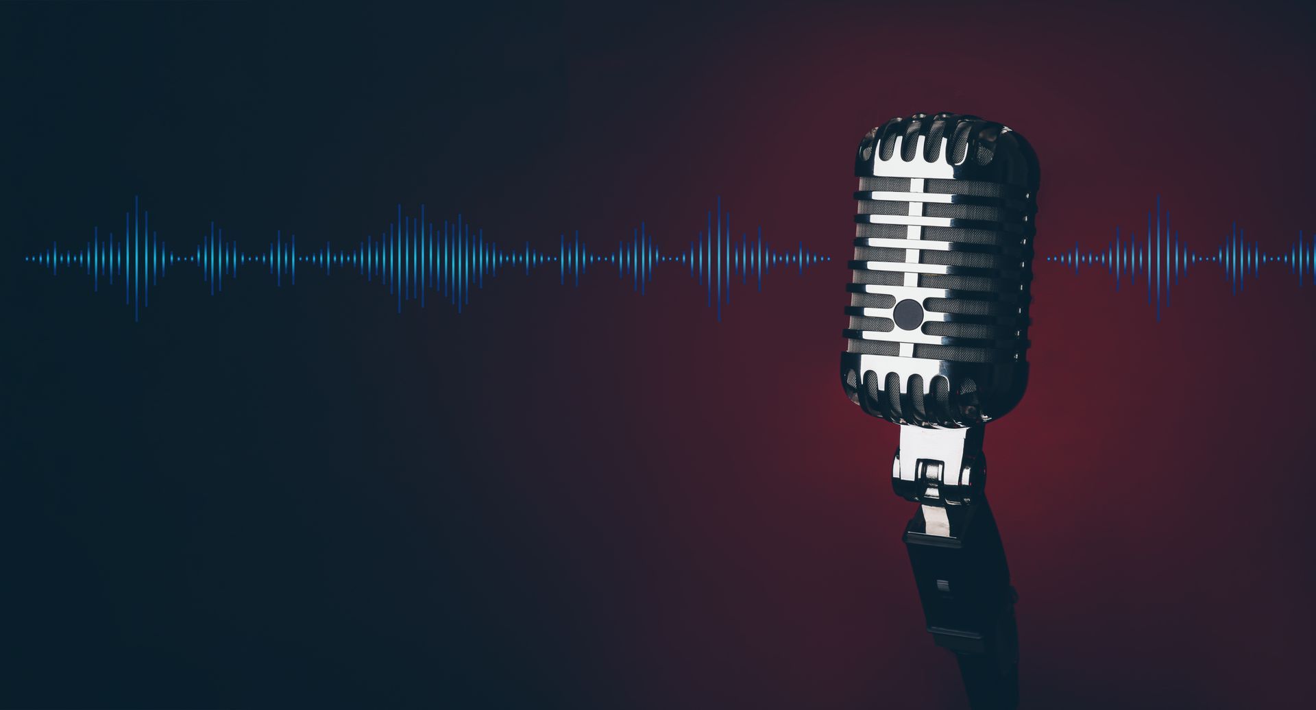 Soundwaves burst from an old fashioned microphone.