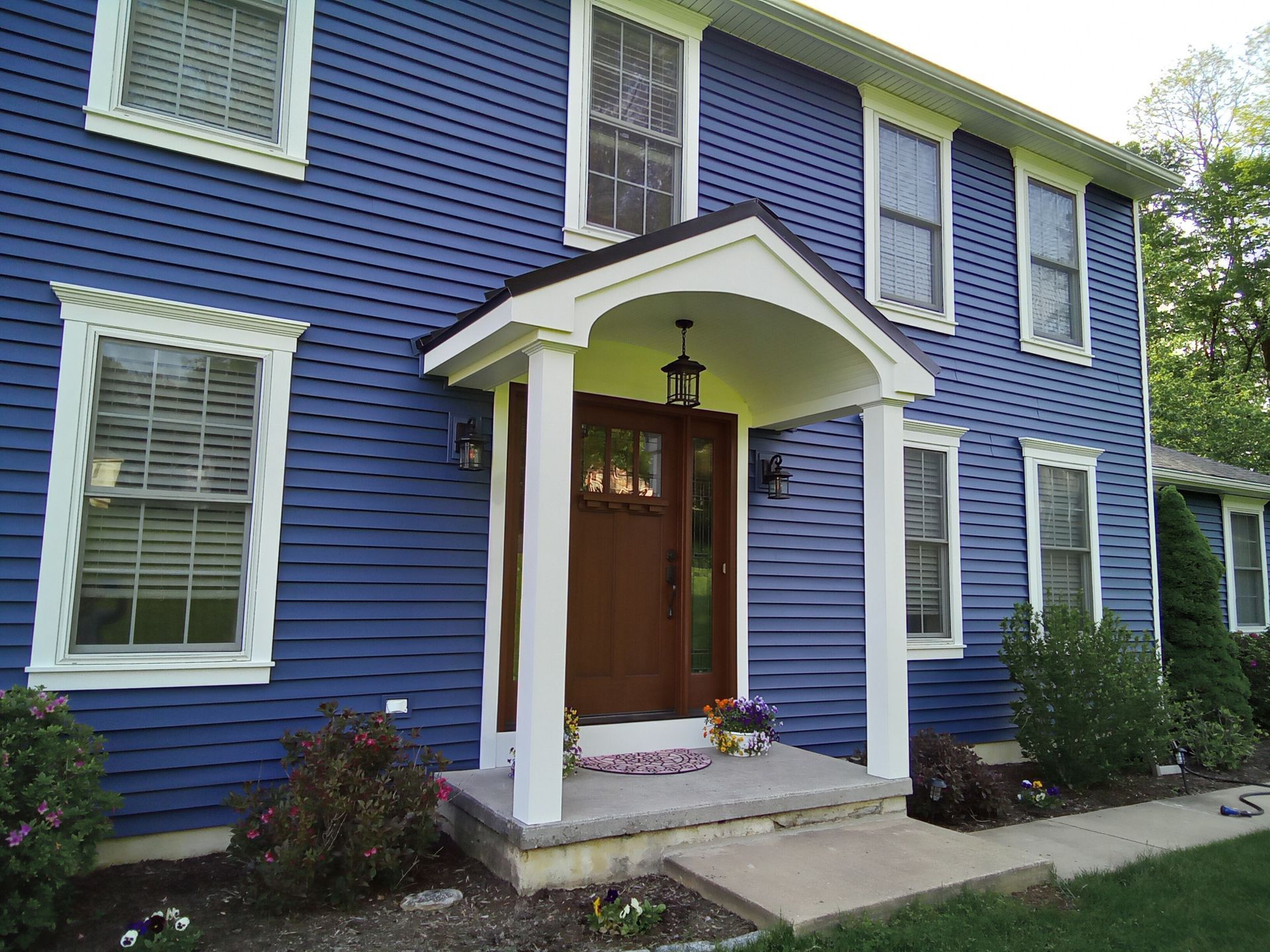 There are two chimneys on the roof of a house - Holland, PA - Esh Home Improvement LLC