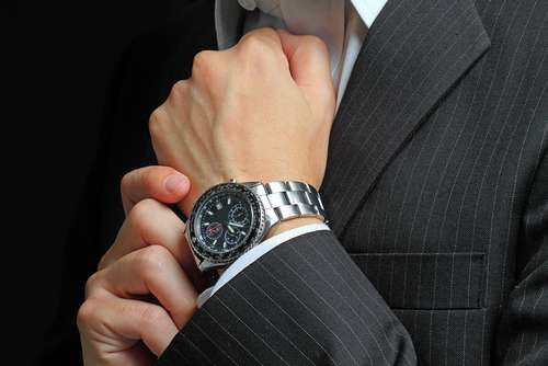 Man in a Suit and Watch on Wrist