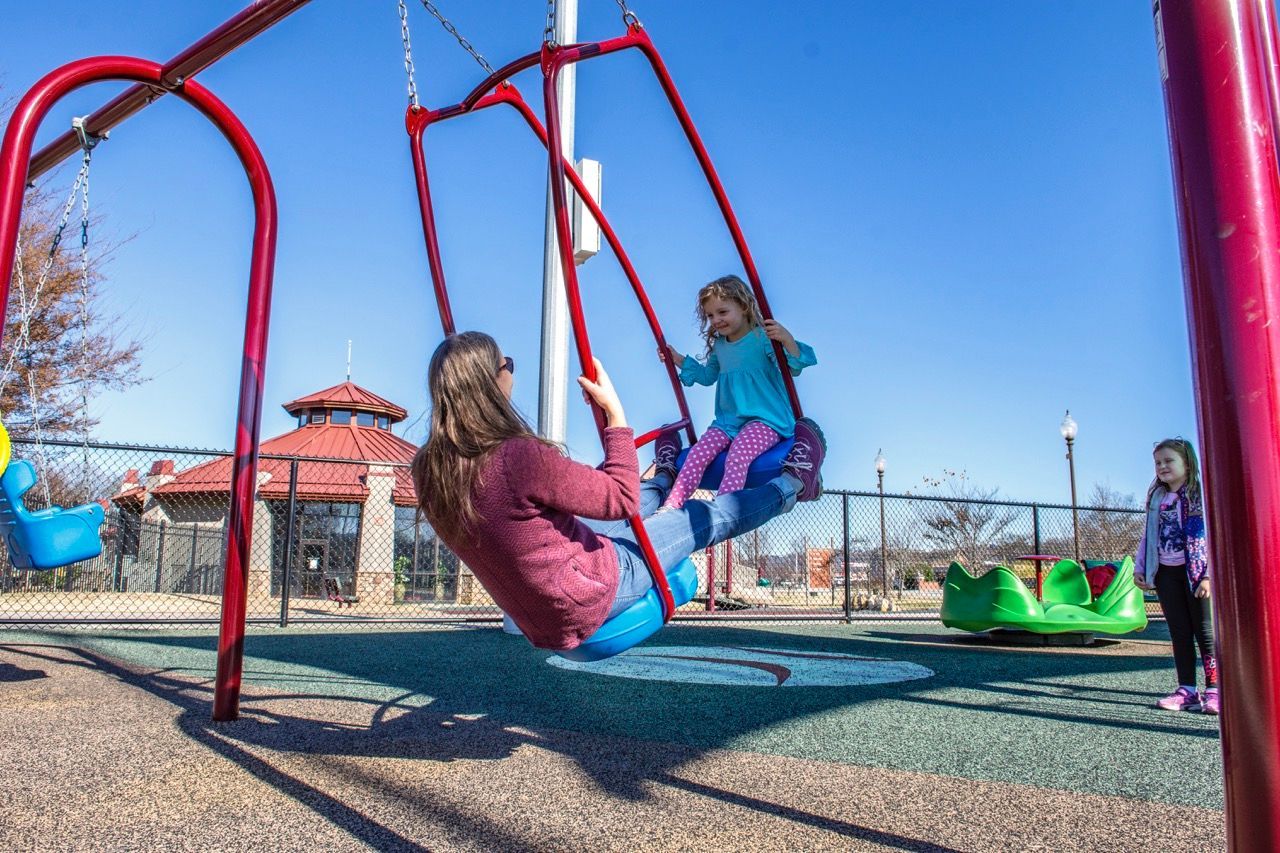Commercial swing set with belt and bucket seats