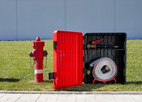 Jonesco kast met brandslangen