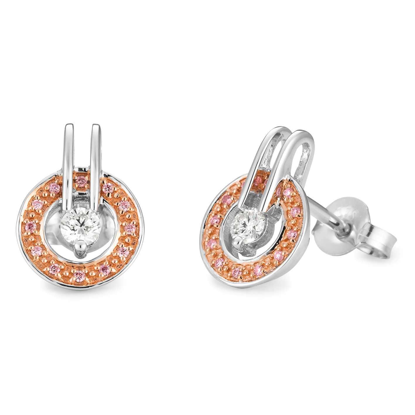 A pair of silver stud earrings with pink stones on a white background.