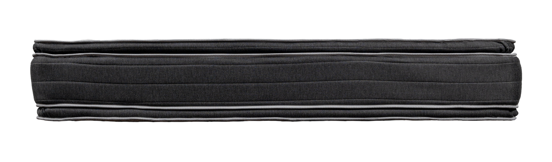 Objeto rectangular negro con varias ranuras horizontales, posiblemente una pieza de automóvil.