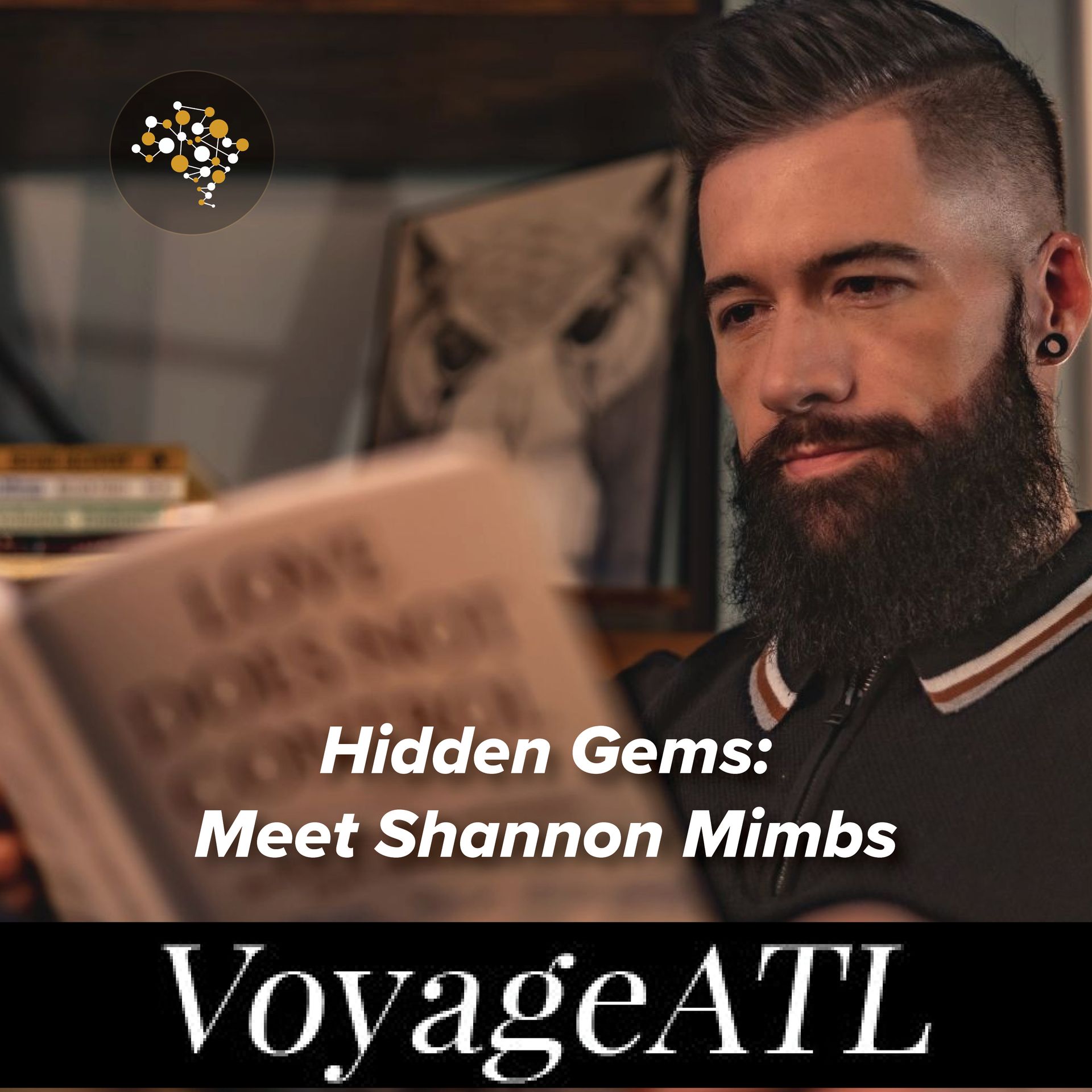 A man with a beard is reading a book called hidden gems