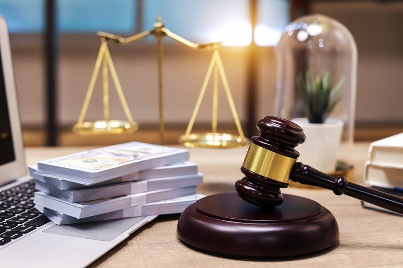 Gavel And Money — Chicago, IL — Suburban Legal Group PC