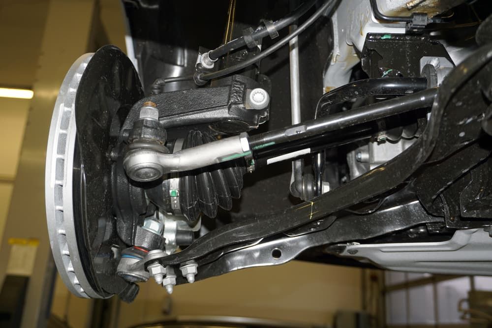A Close up Of the Underside of A Car with A Brake Disc — Andy's A1 Auto Care in Barrack Heights, NSW