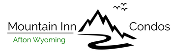 Mountain Inn Condos logo with black mountain silhouette and green “Afton Wyoming” text