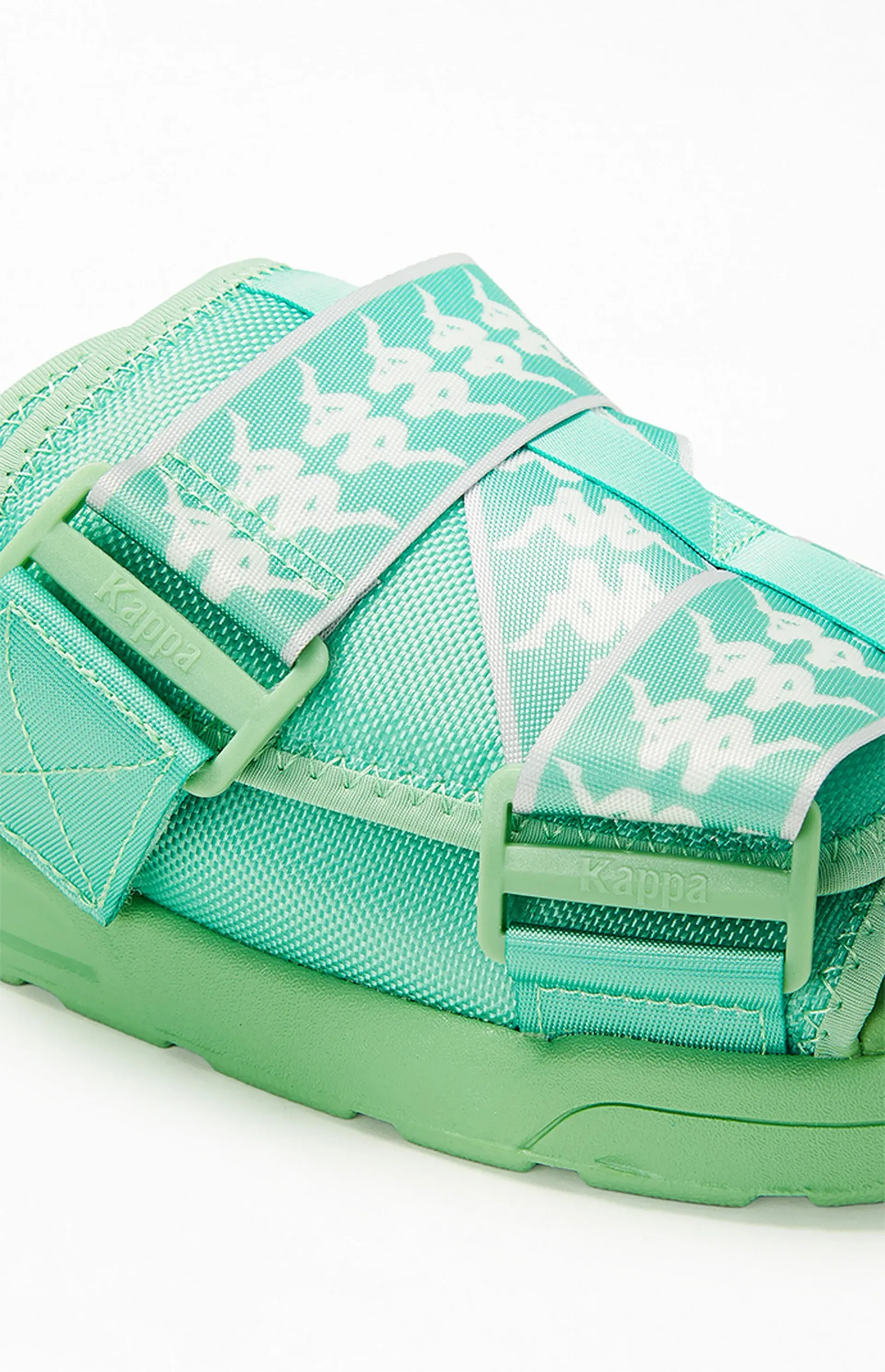 Light green Kappa slide sandals with adjustable straps.