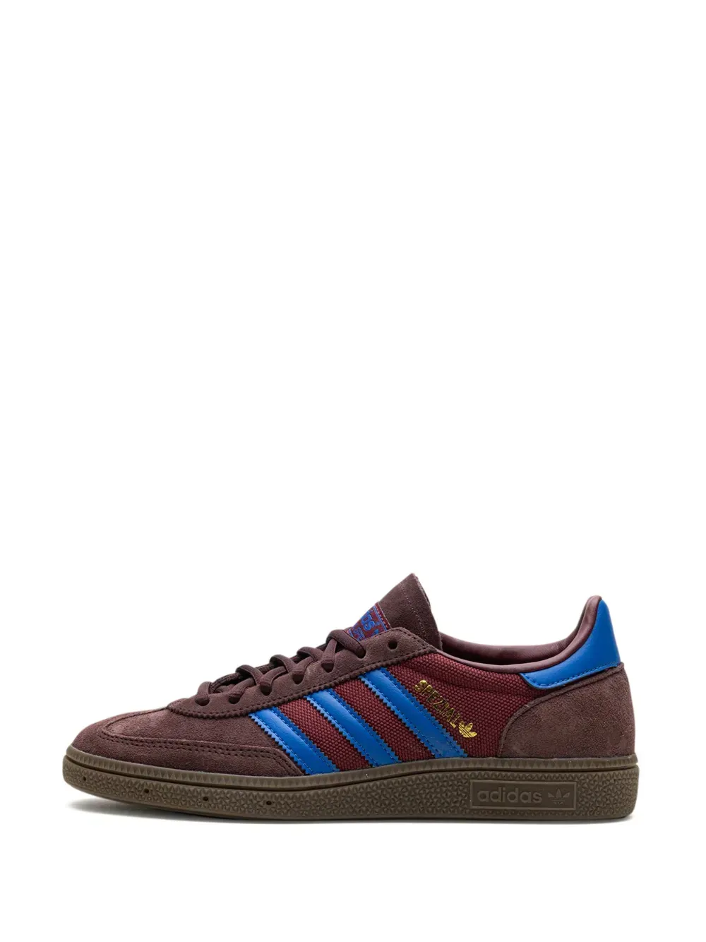 Brown Adidas trainers with blue stripes and accents.