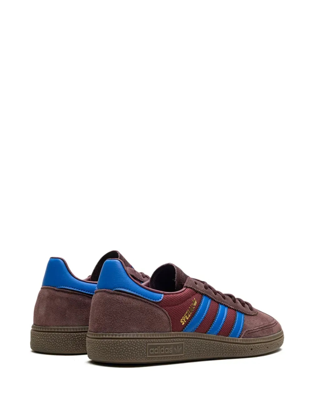 Brown and blue Adidas sneaker with three stripes.