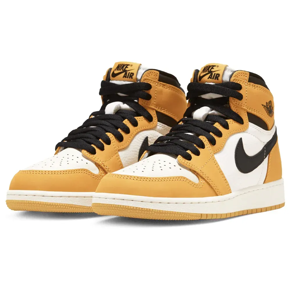 Two pairs of mustard yellow, black, and white Air Jordan 1 high-top sneakers.