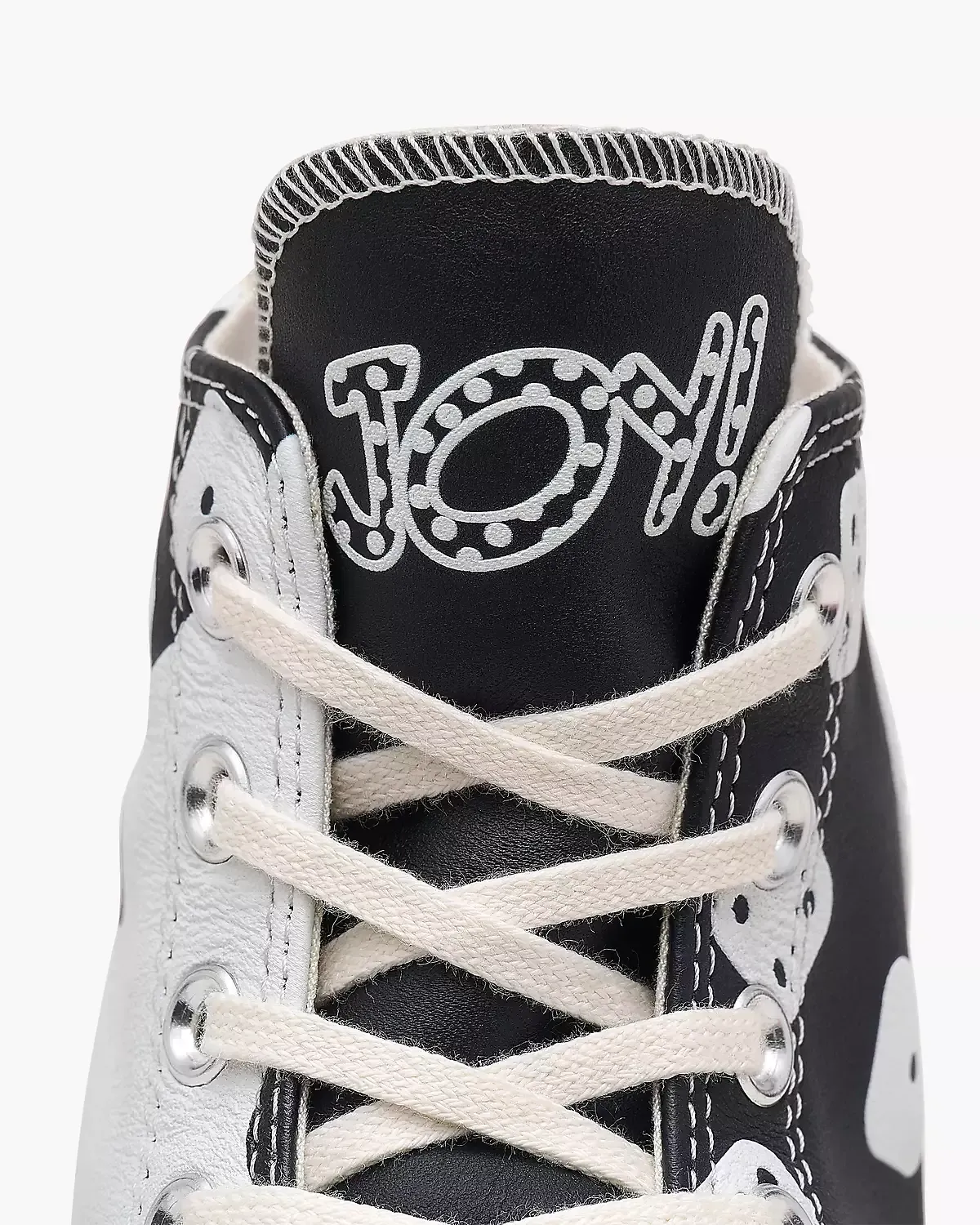 Black and silver Converse sneaker with