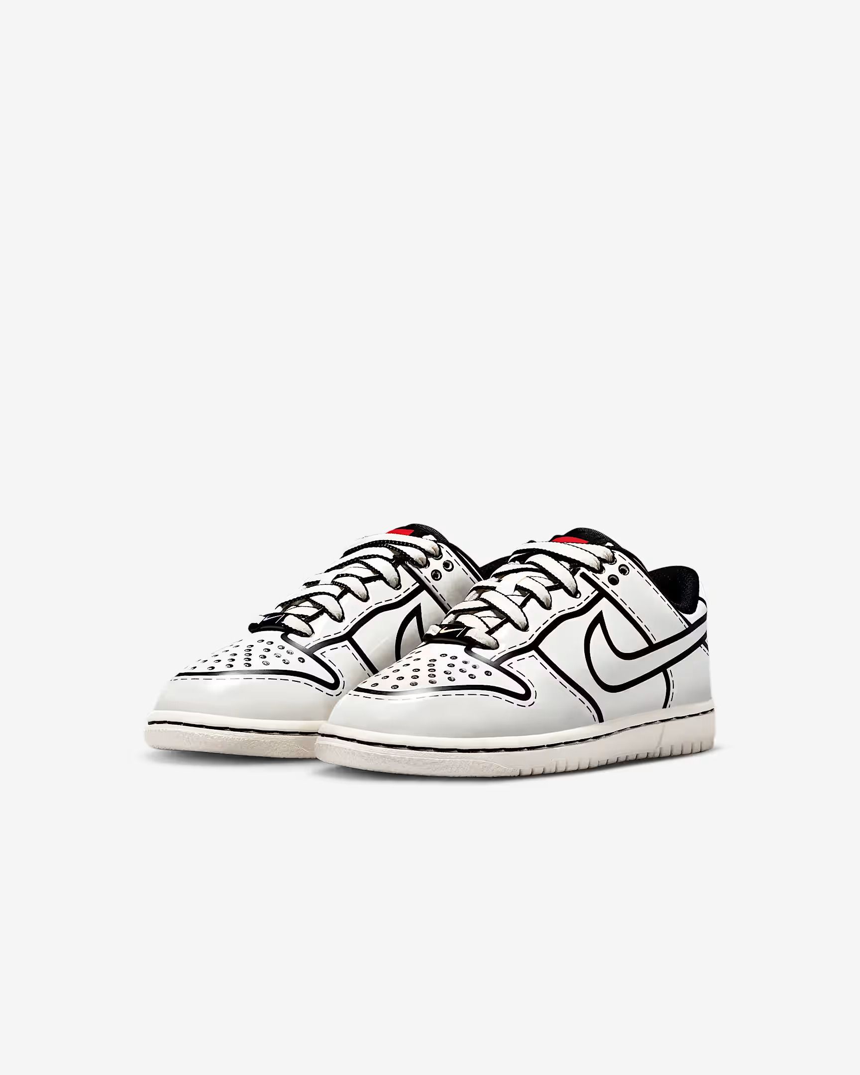 White Nike Dunk Low sneakers with black outline details.