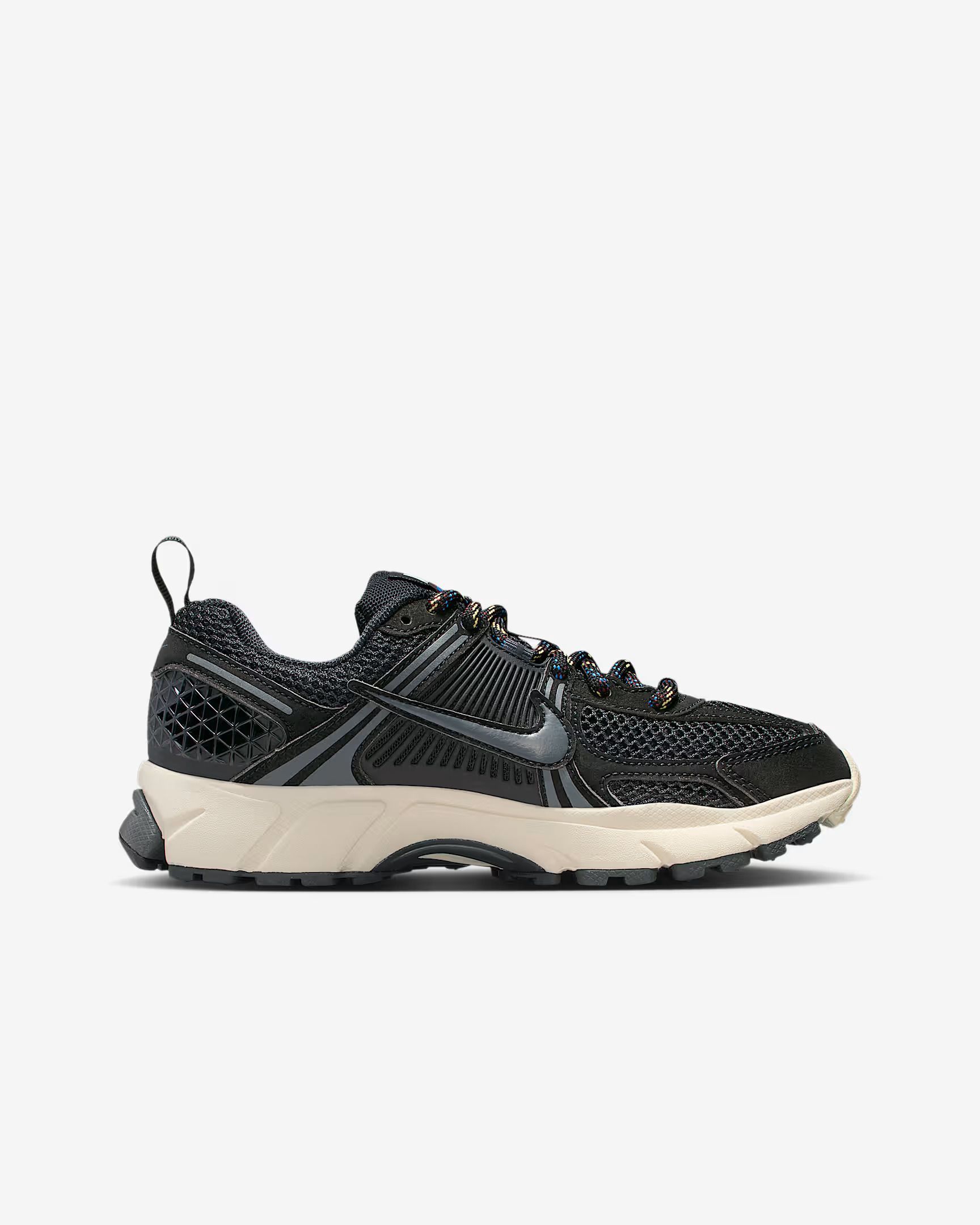 Black and grey Nike trail running shoe with white sole.