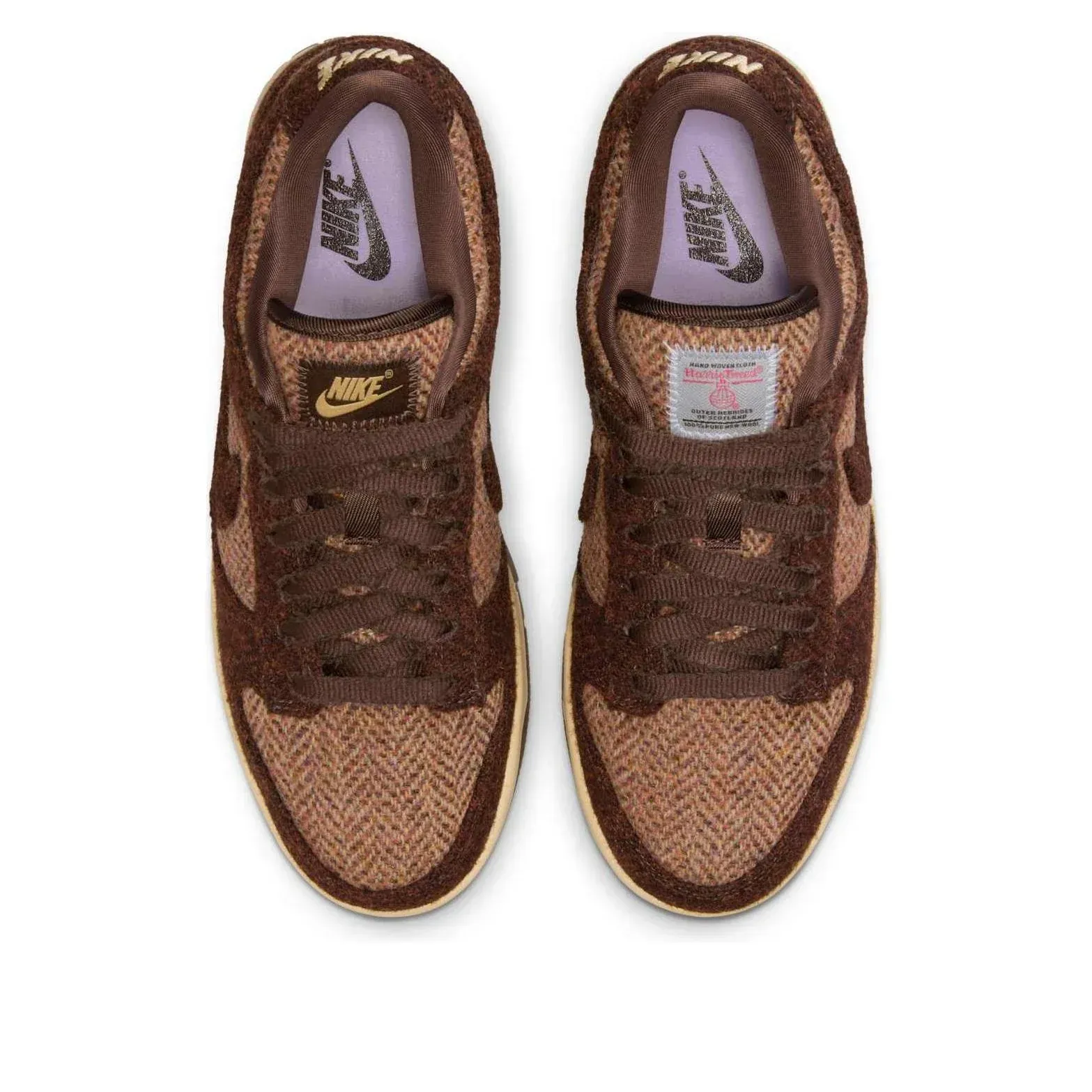 Pair of brown and tan Nike Dunk Low sneakers.
