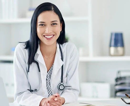Dentist Smiling — Dentist in Kanwal, NSW