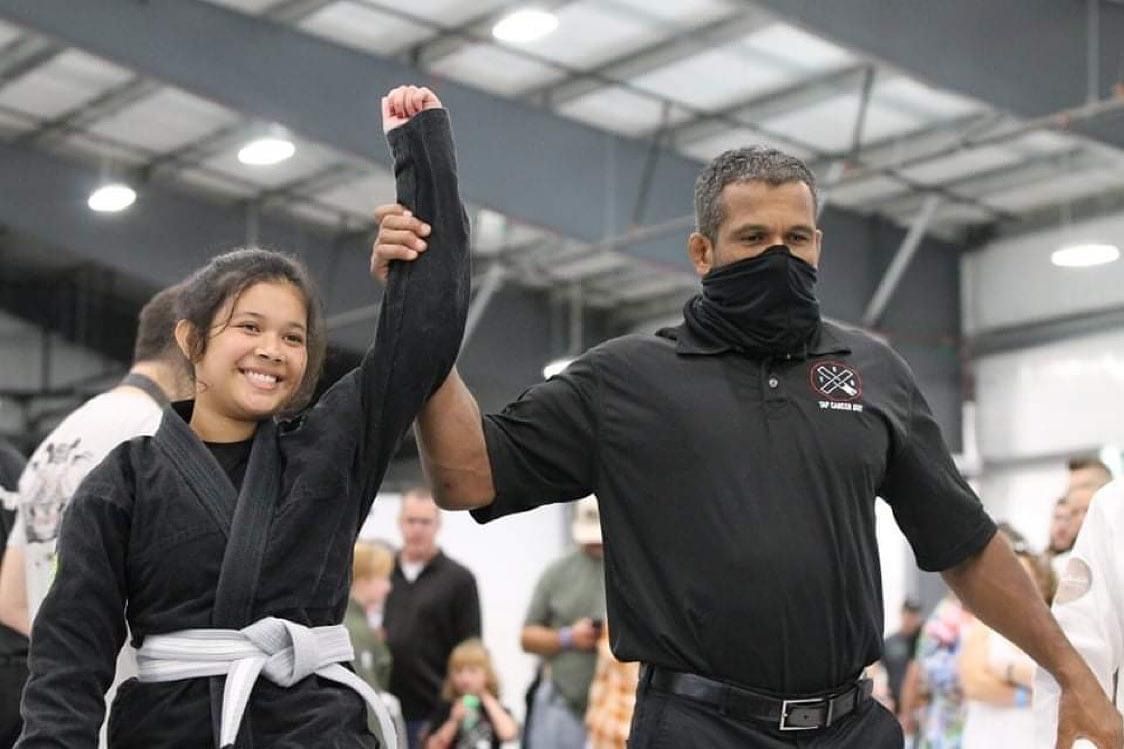 Child Winning a Jiu Jitsu Tournament