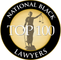A black circular emblem featuring a silhouette of Lady Justice and the text