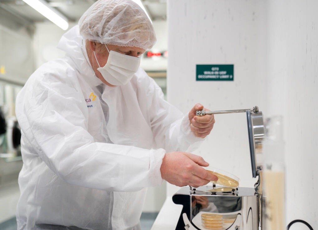 Prime Minister Boris Johnson changes the plate on an ImpectAir-140 during his visit to AstraZeneca Prime Minister Boris Johnson with ImpactAir-140