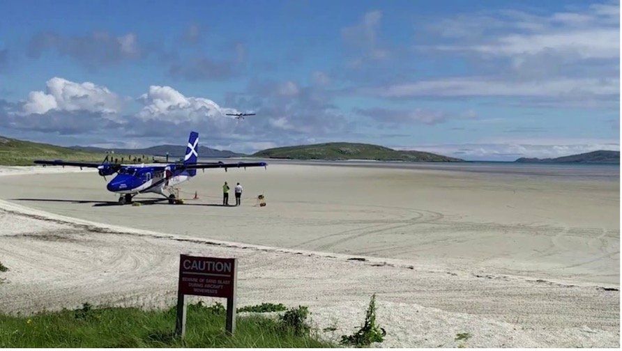 Picture of a plane on Barra airport, which is on the beach
