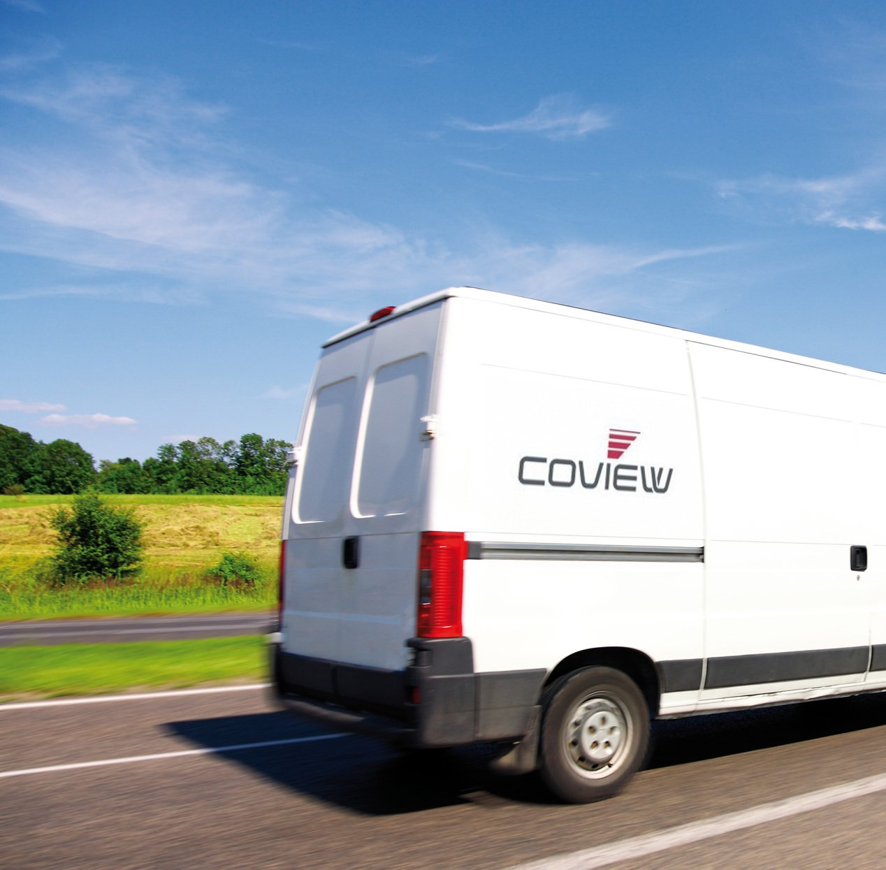 White Coview van on the road