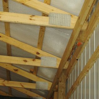 Barn with black metal roofing Tulsa, OK A&C Barn Builders, LLC