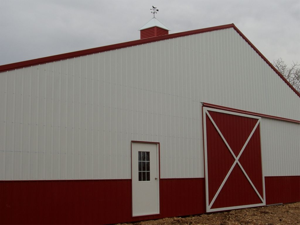 Custom barn with metal siding Tulsa, OK A&C Barn Builders, LLC