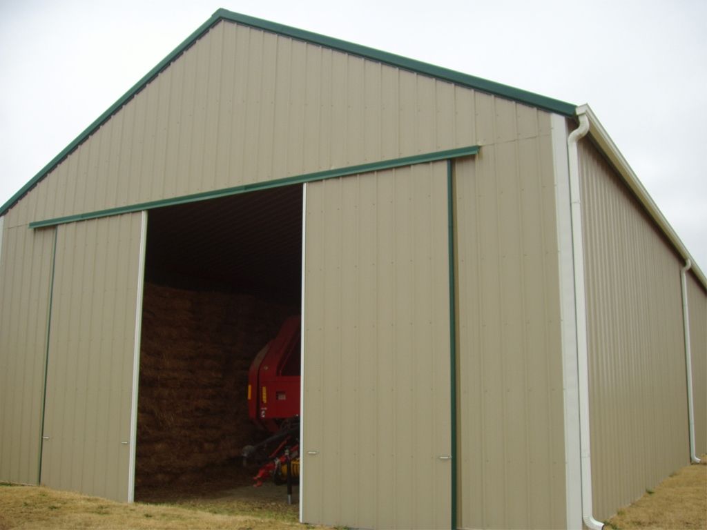 Steel barn with tall overhead doors Tulsa, OK A&C Barn Builders, LLC