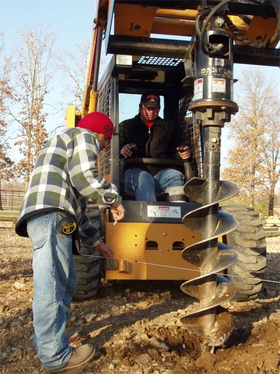 Barn construction equipment onsite Tulsa, OK A&C Barn Builders, LLC