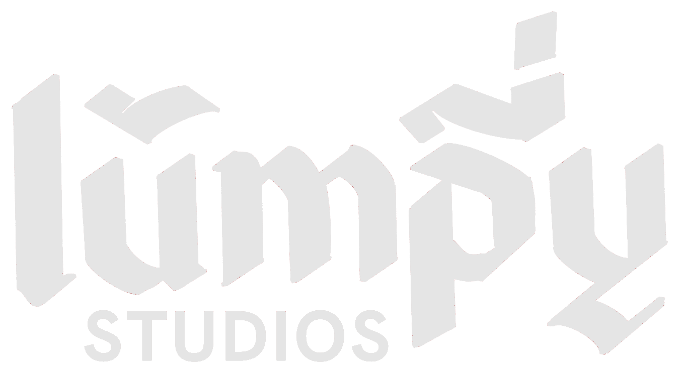 A white logo for lumpy studios on a white background.