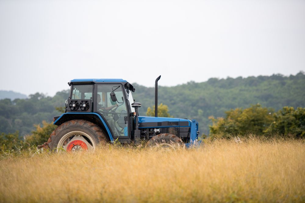 A Tractor is Plowing a Field With Discs — LJE MechanicaI  Dubbo, NSW