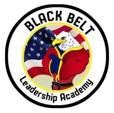 a black belt leadership academy logo with an eagle holding an american flag .