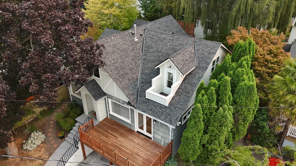 Aerial view of a completed Malarkey Highlander shingle roof on a Tudor home in North Portland (93)