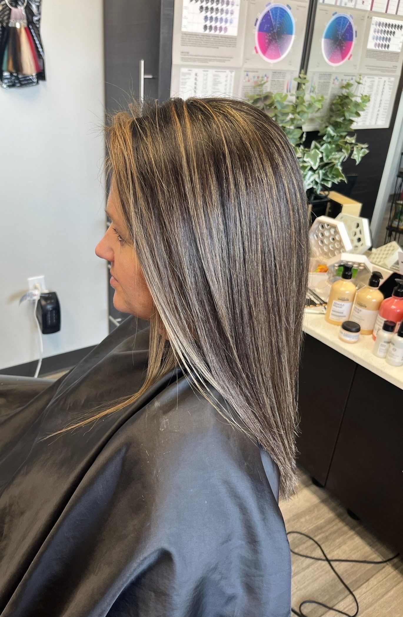 A woman is in a salon.
