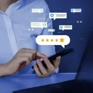 Person using smartphone with floating chat icons and a five-star rating overlay on a blue background