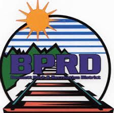 Logo for the Bennett-Park Recreation District. Includes sun, mountains, train tracks and BPRD initials.