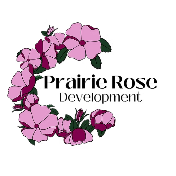 Prairie Rose Development logo: Pink floral wreath surrounds text.