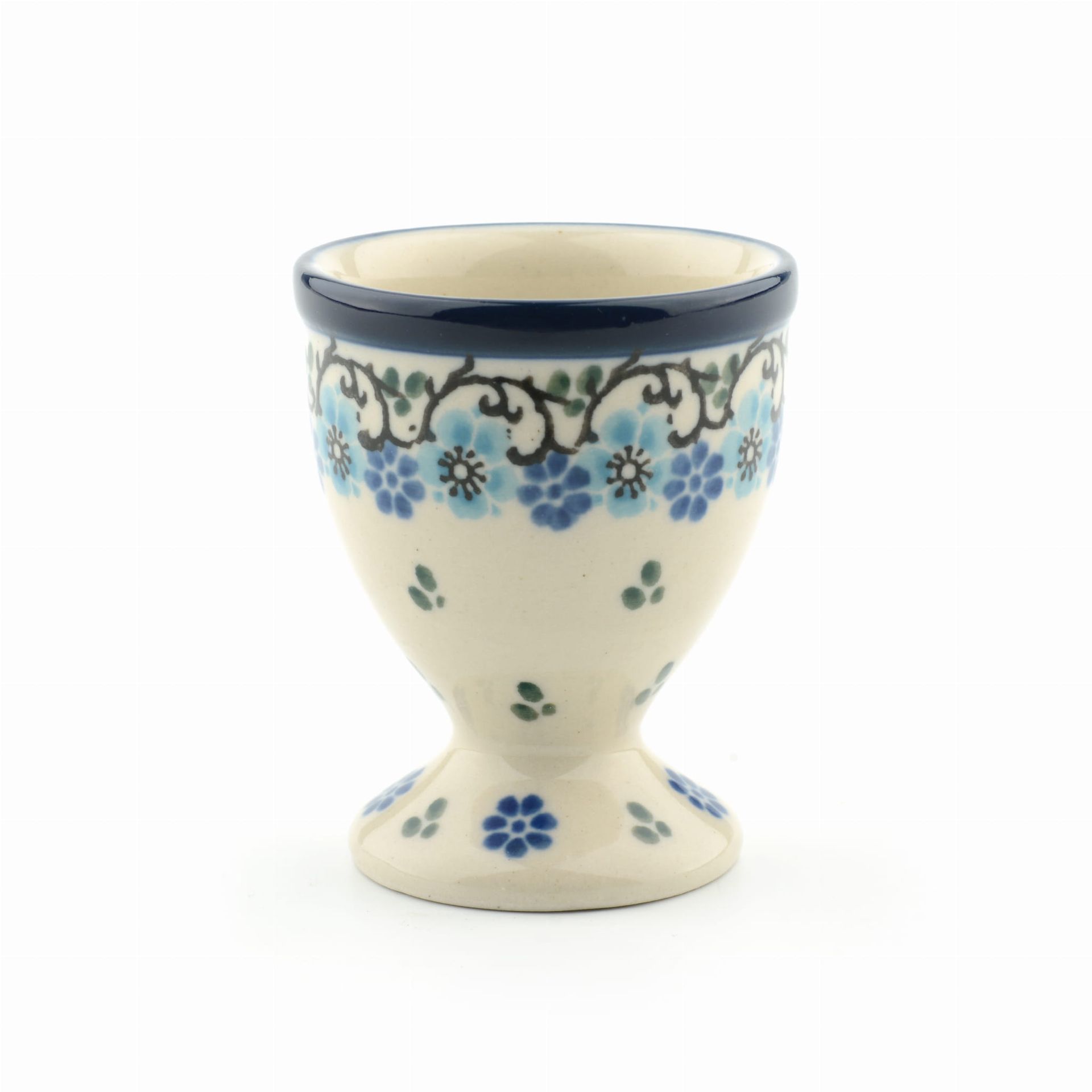 Keramische eierdop met blauw bloemenpatroon en donkerblauwe rand.