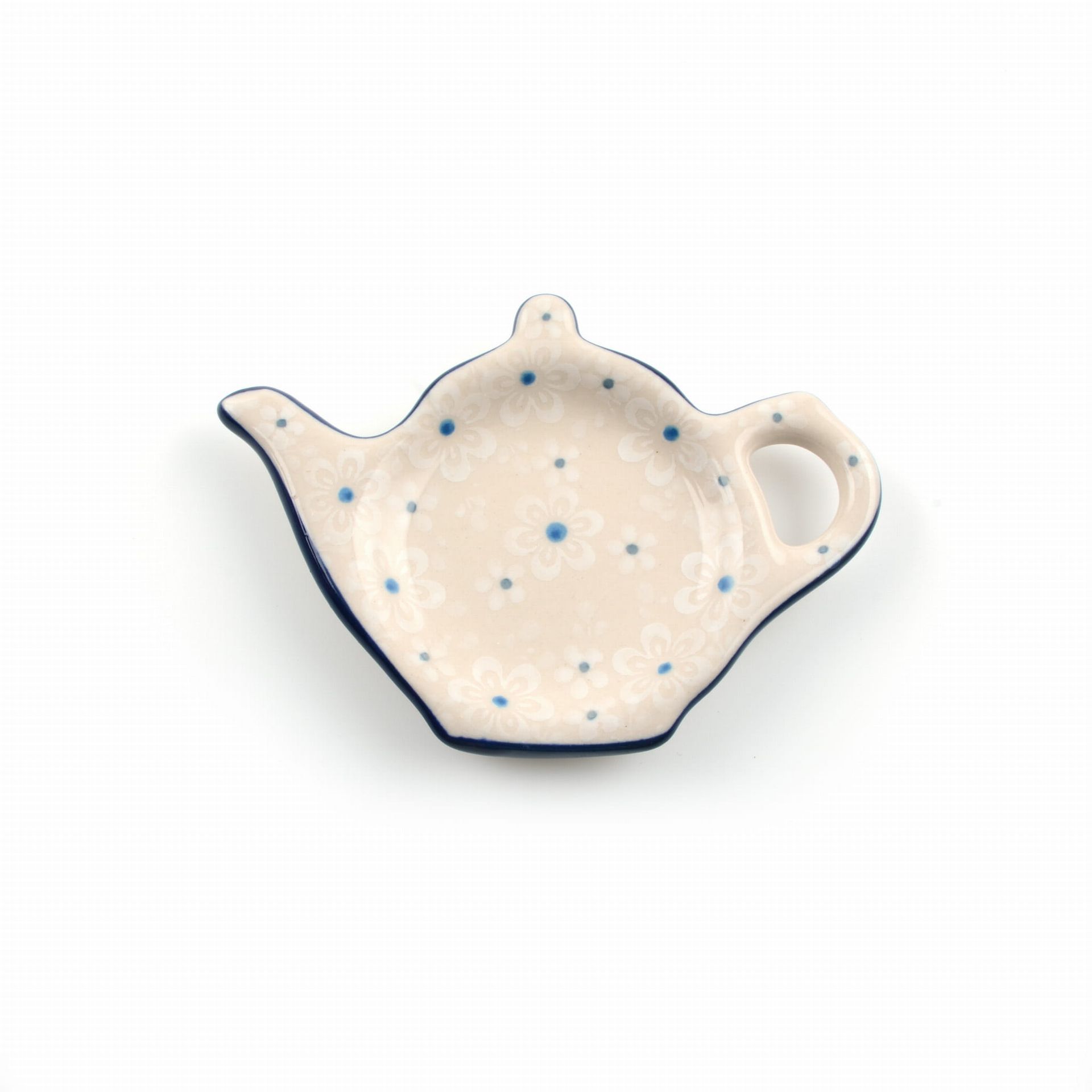 Keramische theezakjeshouder in de vorm van een theepot, beige met een blauw bloemenpatroon en blauwe rand.