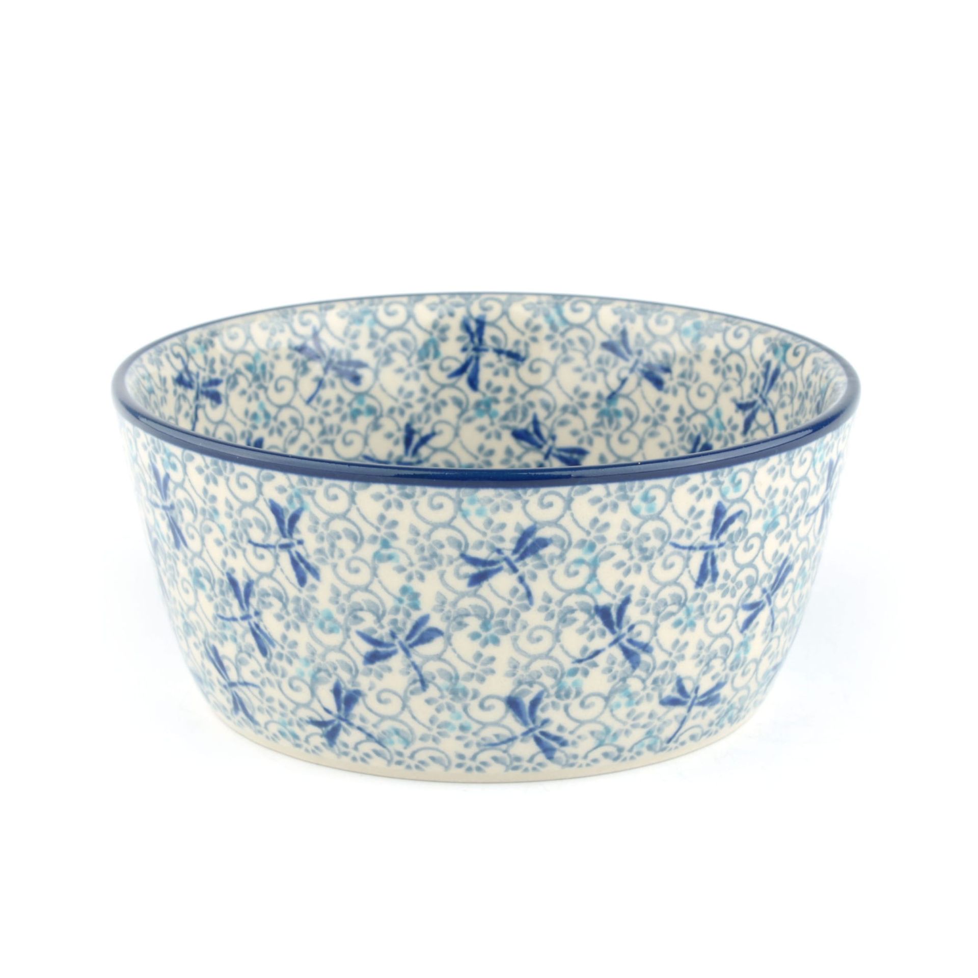 Keramische kom met blauw libellenpatroon en blauwe rand.
