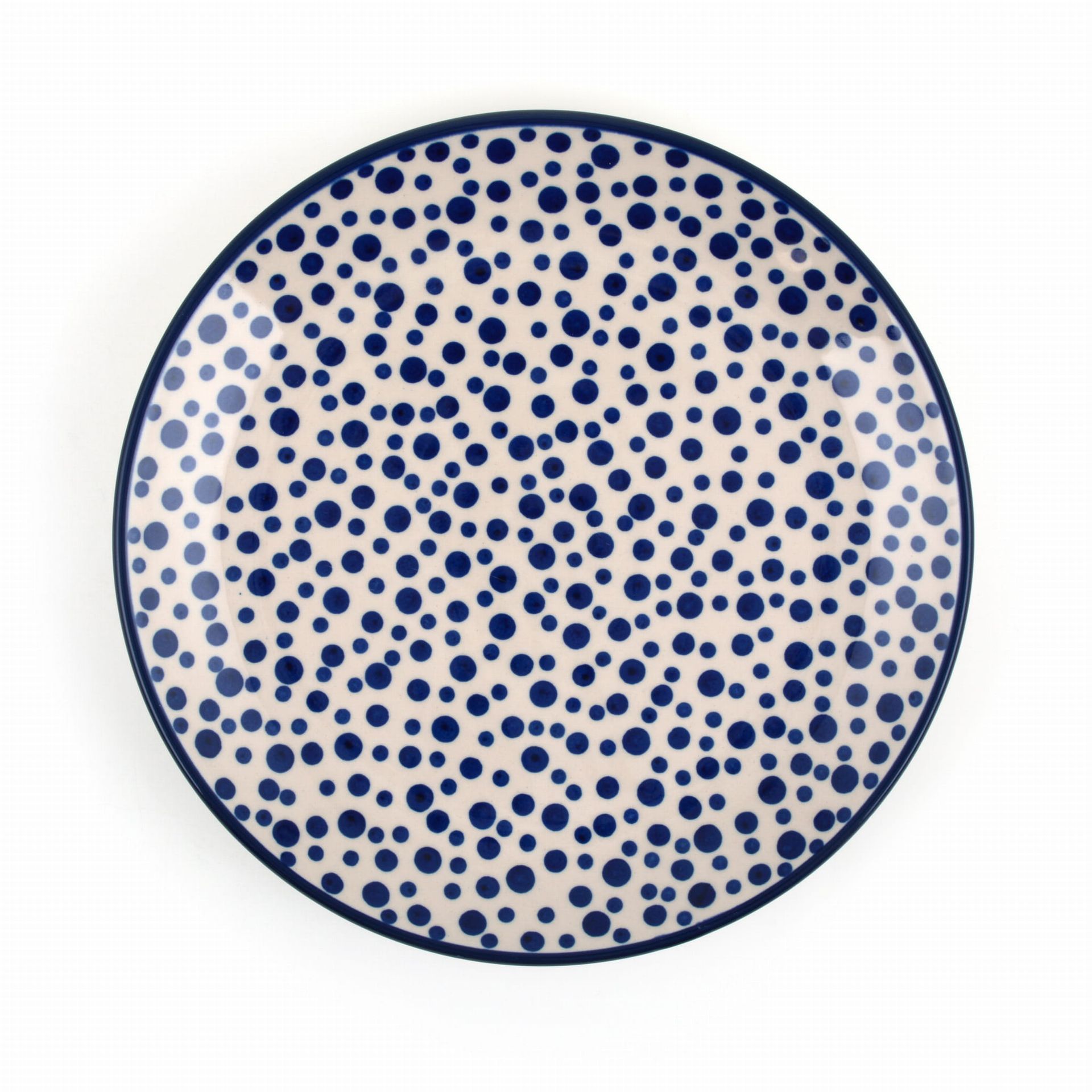 Blauw bord met stippen op een witte achtergrond, met een donkerblauwe rand.