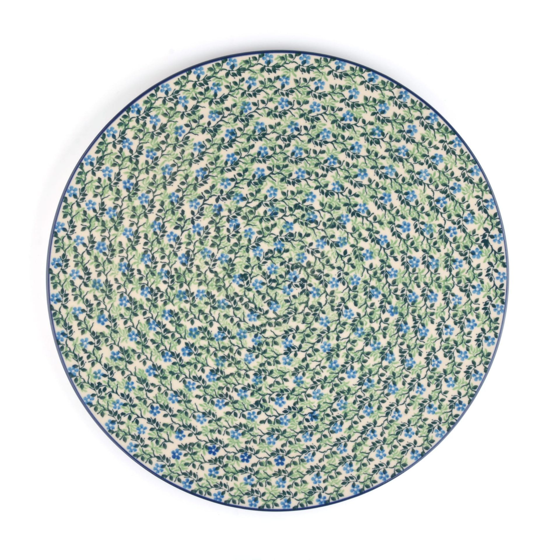 Ronde placemat met blauw bloemenpatroon en blauwe rand op een witte achtergrond.