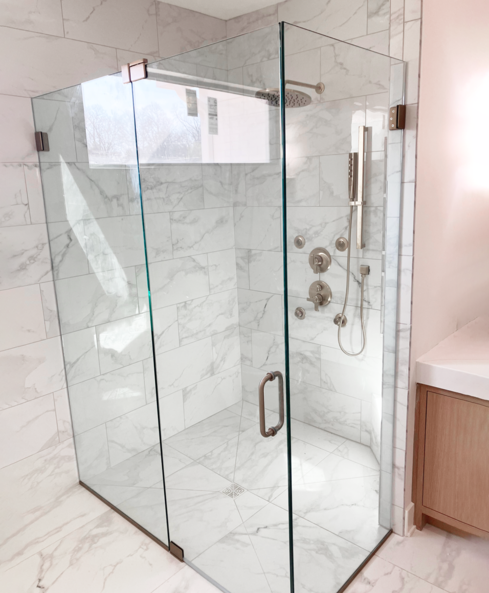Celesta Panel/Door/Return Panel Shower Door featuring Clear glass with Brushed Nickel metal finishes.